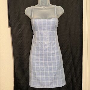 Blue all over sequin dress with white details